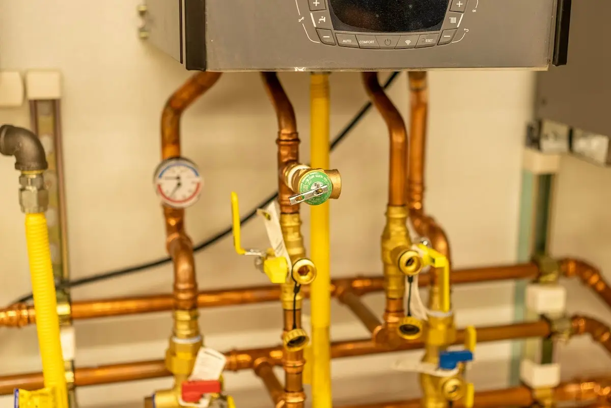 Licensed technician providing Water Heater Installation for a homeowner in Manchester